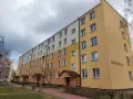 Blok mieszkalny przy ul. Łukaszyńskiej 15. Chcesz wiedzieć, jak napisać pismo do spółdzielni mieszkaniowej o remont?
